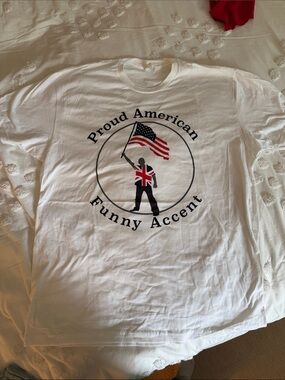White 'Proud American Funny Accent' Graphic Tee.